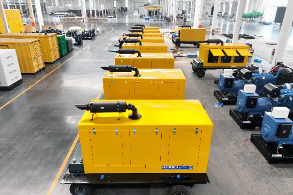 Industrial diesel generator with soundproof enclosure installed at commercial facility