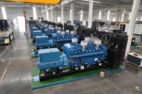 Large industrial diesel generator in weatherproof enclosure at modern power facility