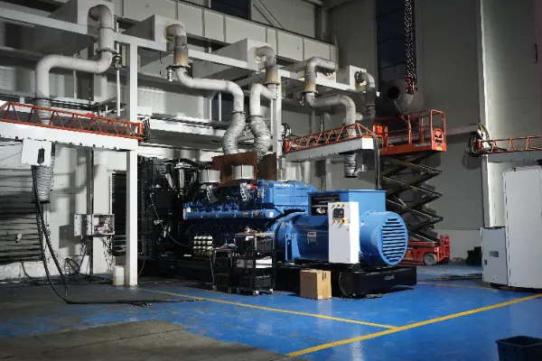 Modern industrial generator testing facility with technicians